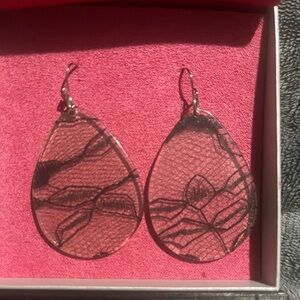 These are brand new pierced dangled earrings by Nikki Chu